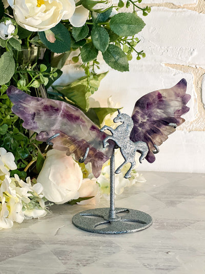 FLUORITE UNICORN WINGS ON PURPLE GLITTER STAND Revive In Style Vintage Furniture Painted Refinished Redesign Beautiful One of a Kind Artistic Antique Unique Home Decor Interior Design French Country Shabby Chic Cottage Farmhouse Grandmillenial Coastal Chalk Paint Metallic Glam Eclectic Quality Dovetailed Rustic Furniture Painter Pinterest Bedroom Living Room Entryway Kitchen Home Trends House Styles Decorating ideas